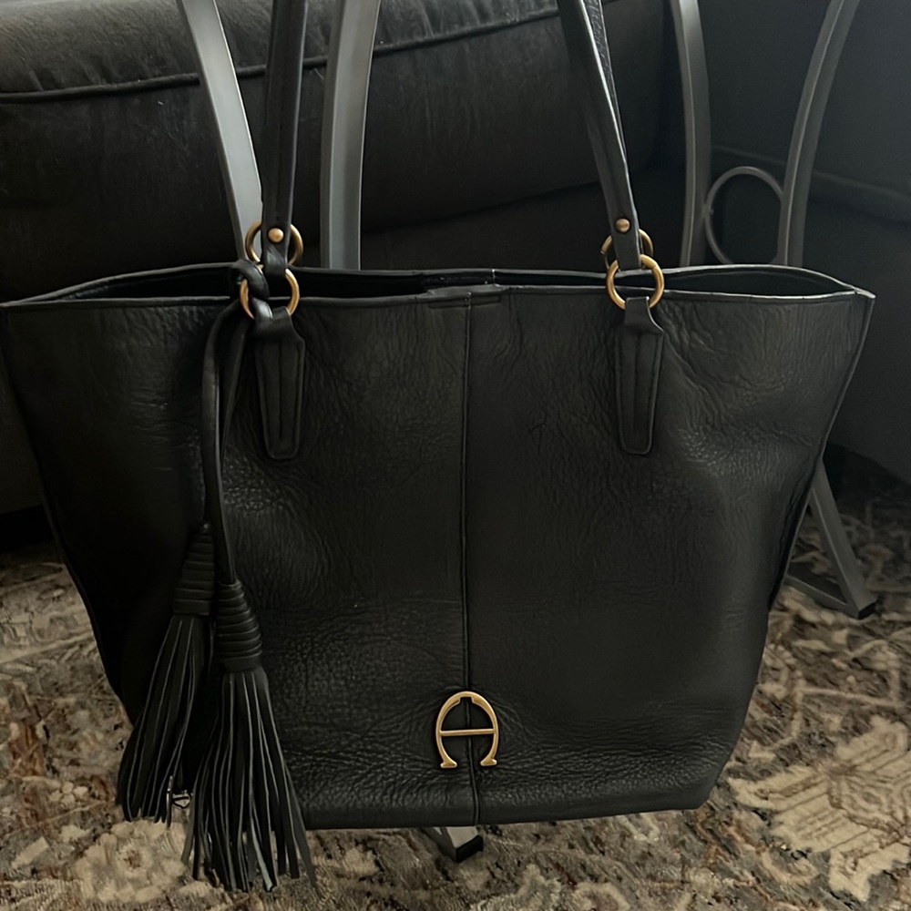Leather, like new, Etienne Aigner tote bag in black.